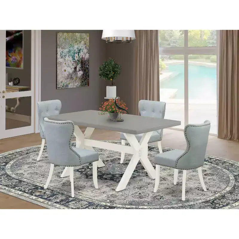 Tavolo da pranzo a 5 pezzi con piano in legno massello con finitura in rovere naturale e 4 sedie Parson